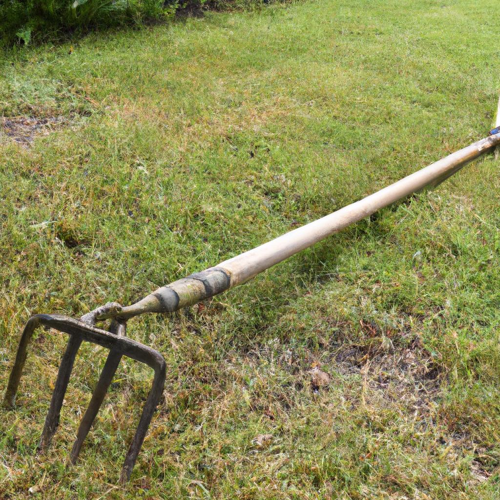 The trake garden tool effortlessly removes weeds from the soil.